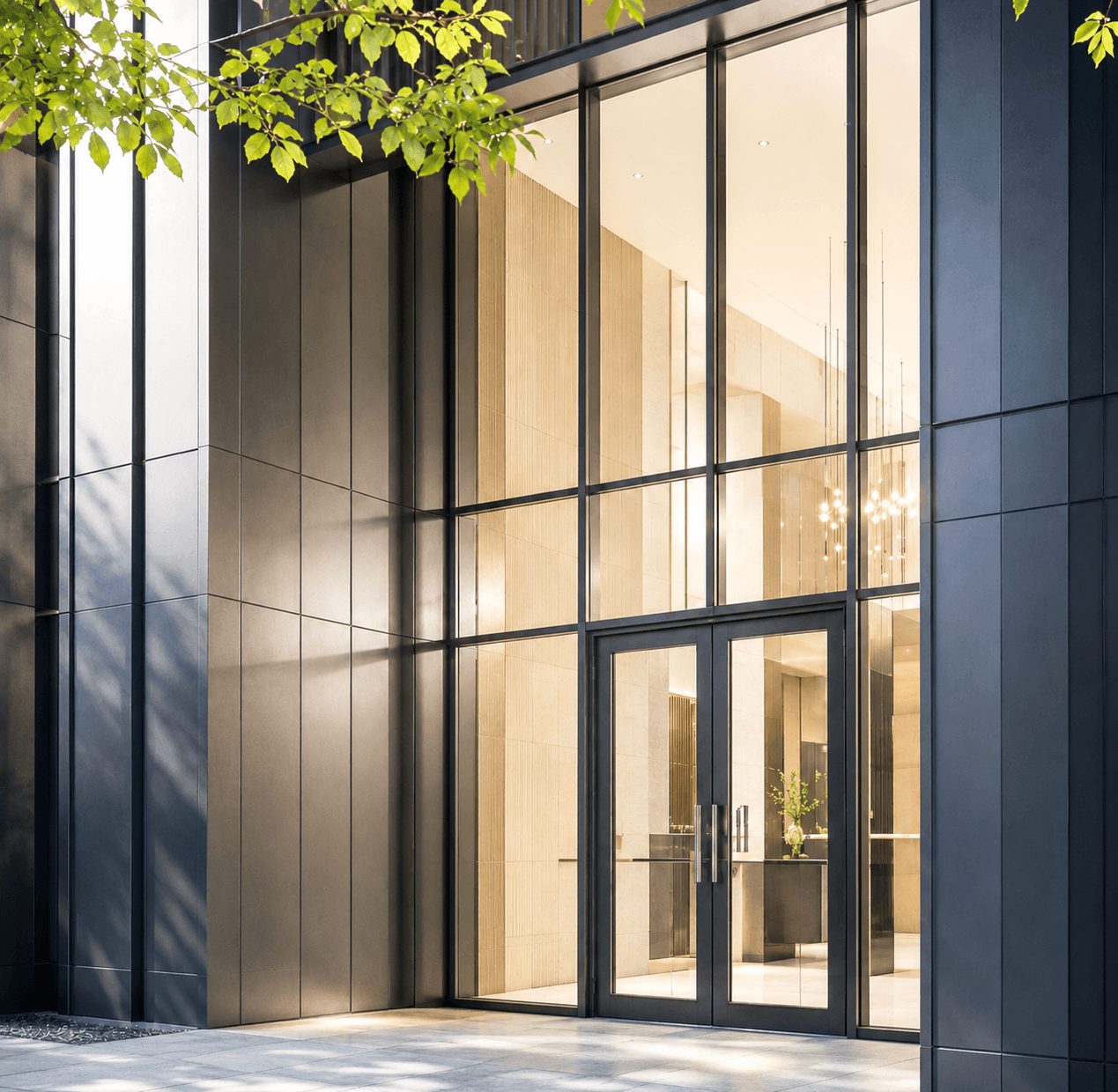 The Parisian entrance with glass and blackened metal