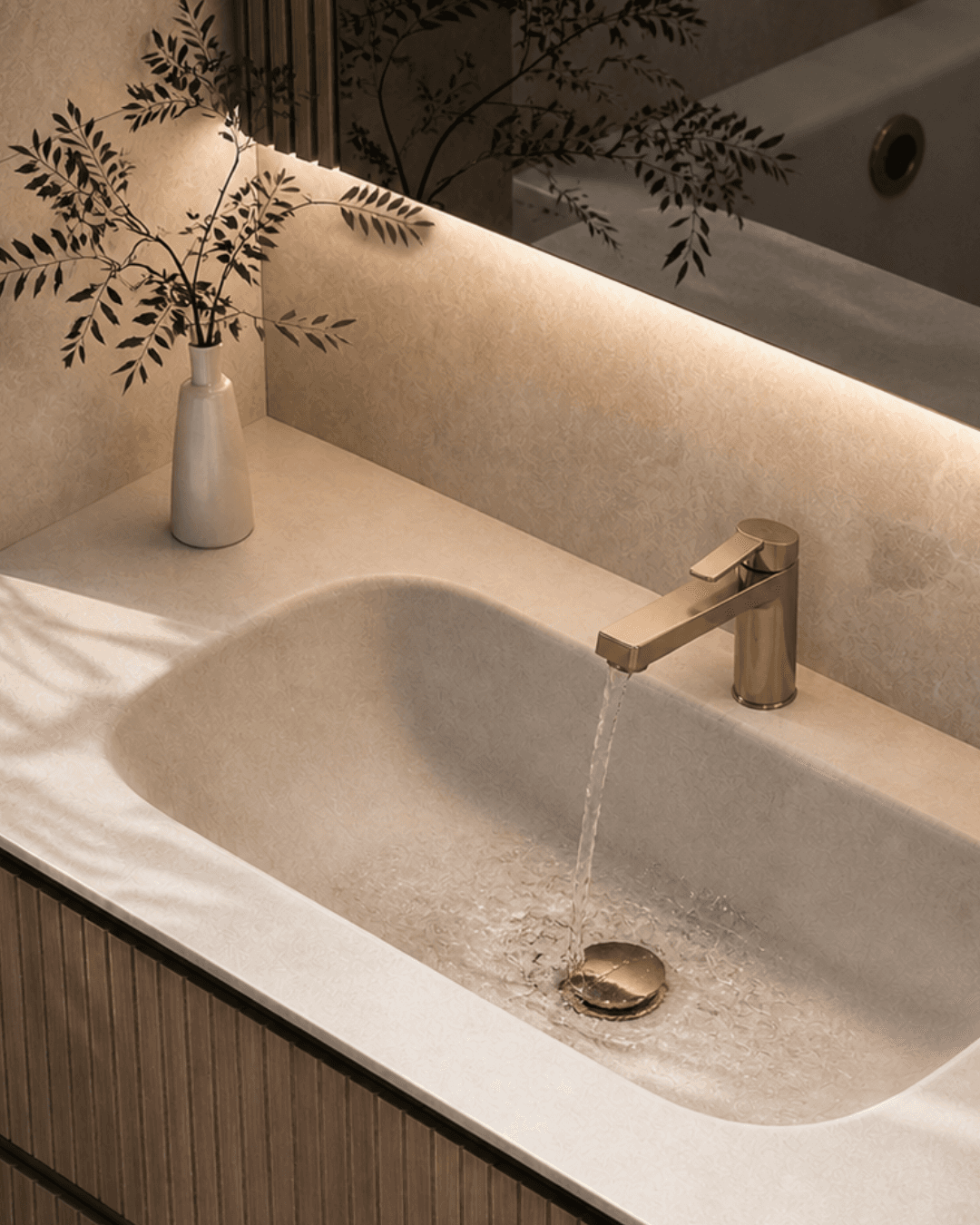 Integrated stone sink with gold faucet and fluted wood cabinet